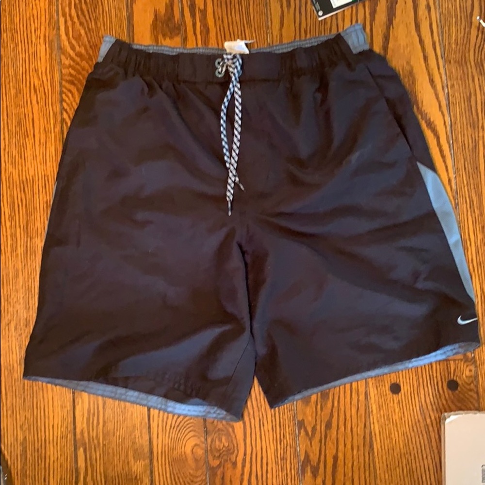 New, Nike men’s swim trunks Black/Grew